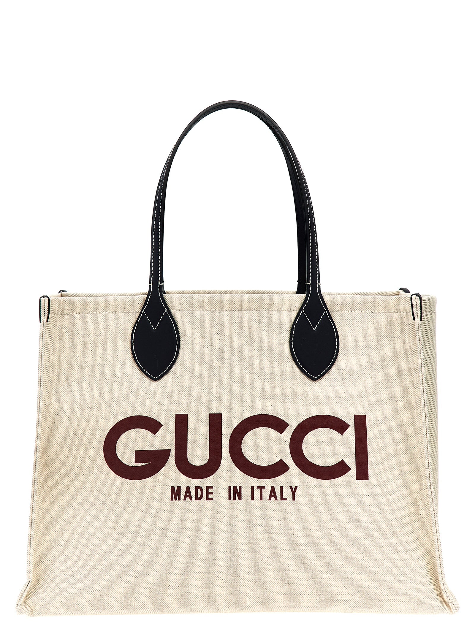 Sac à main Gucci beige en polyéthylène, sac fourre-tout élégant avec poignées, visible de face.