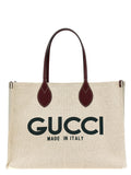 Sac Gucci beige en polyéthylène avec poignées, aperçu du sac cabas élégant et spacieux pour le quotidien.