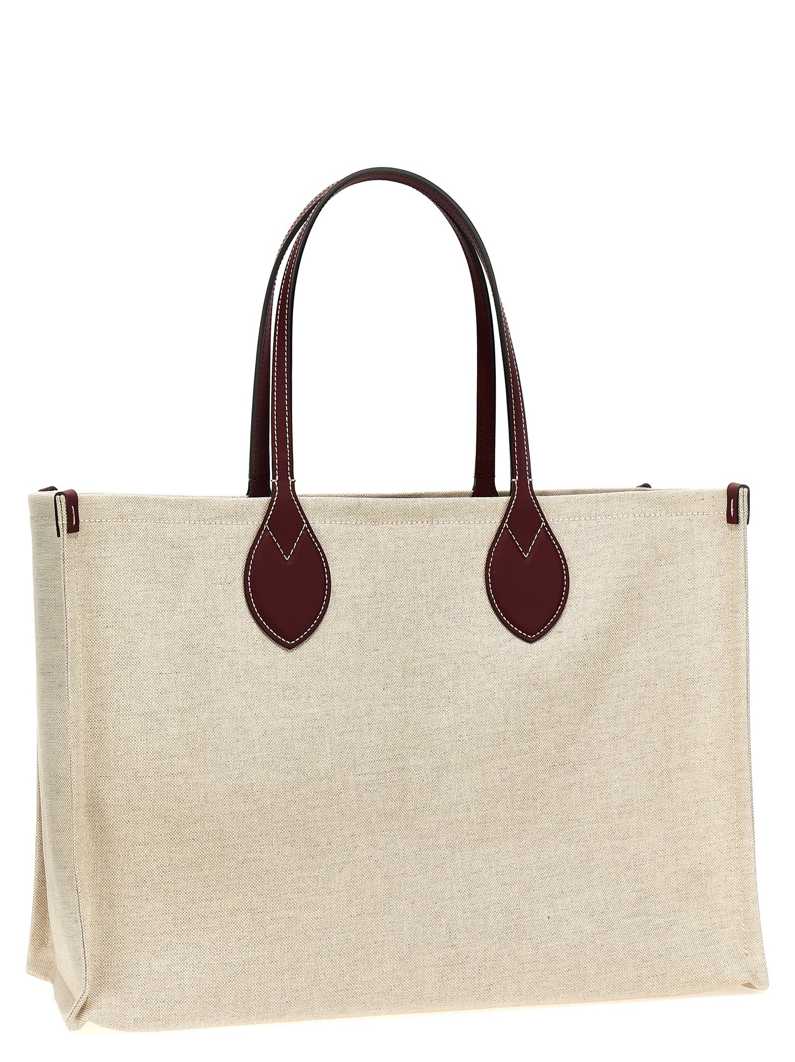 Sac tote en polyethylene beige de Gucci, vue de face, avec logo Gucci visible, idéal pour un look élégant et pratique.