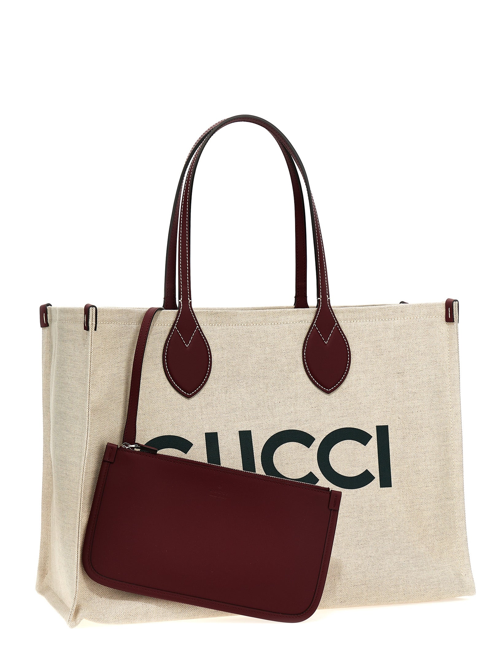 Sac tote en polyethylene beige de Gucci avec logo Gucci visible, idéal pour un style élégant et pratique.