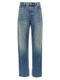 Jeans boyfriend en coton bleu de marque Gucci, coupe décontractée et détails modernes, vues en gros plan.
