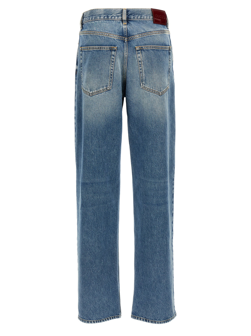 Jeans boyfriend en coton bleu de Gucci, coupe décontractée, avec détails de couture visibles.