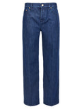 Jeans droits en coton bleu Gucci, style classique, visible en détail sur l'image.