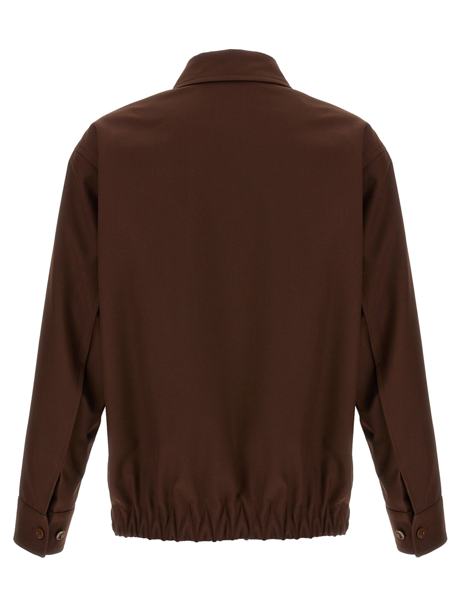 Veste longue en laine marron Gucci, coupe élégante, détails raffinés, portée sur un mannequin.