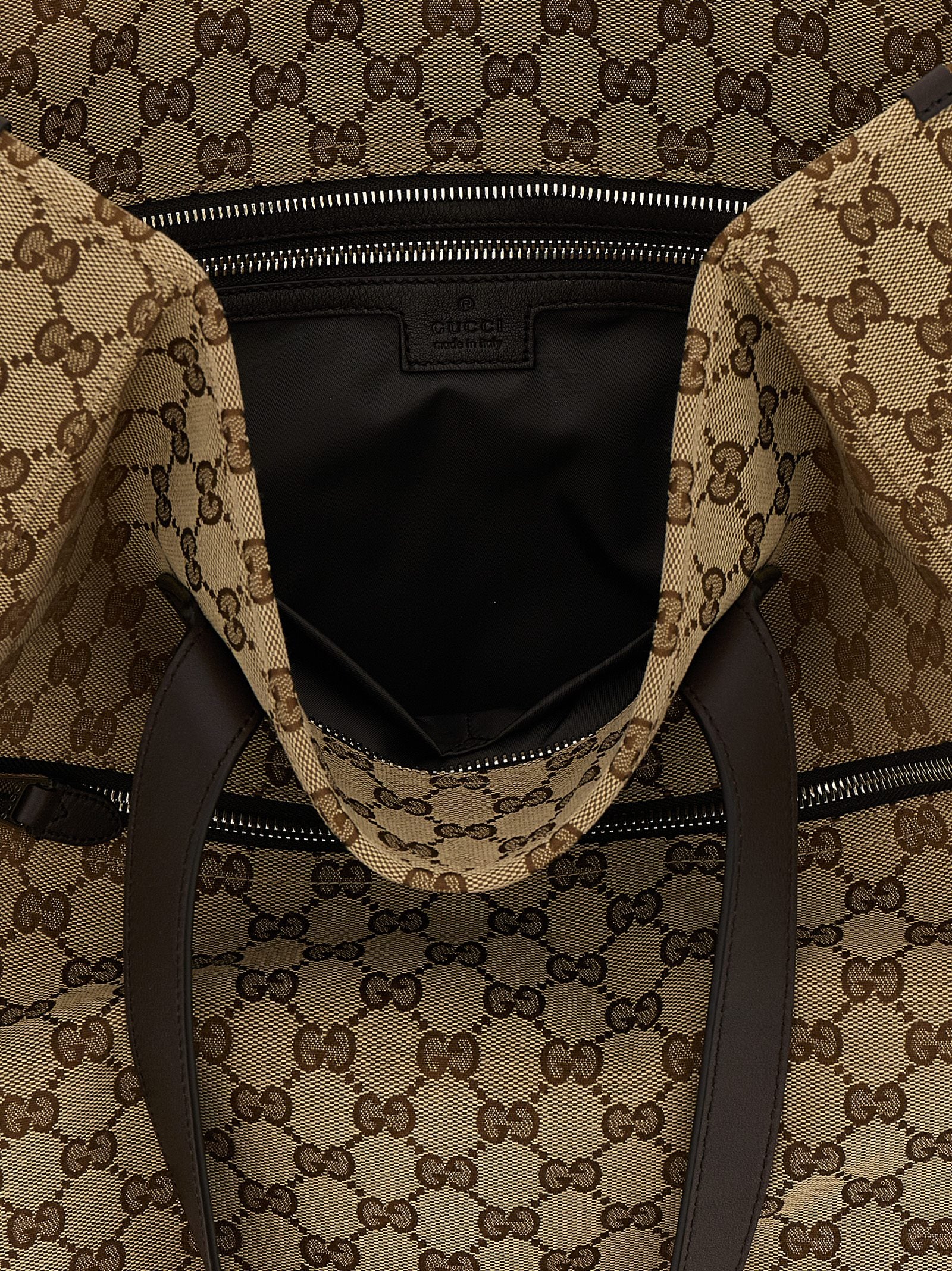 Sac à bandoulière en polyester marron Gucci, vue de face avec détails du logo et des poignées.