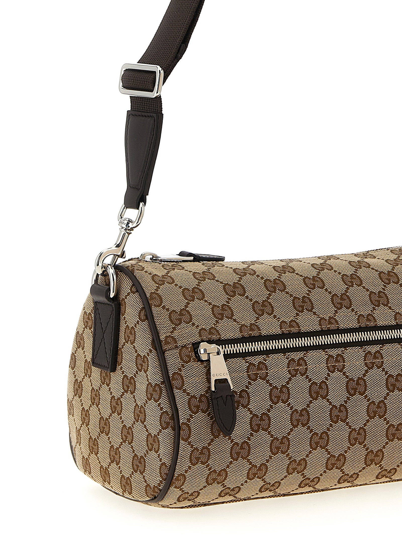 Sac à bandoulière en polyester beige Gucci, avec design élégant et détails de la marque visible.