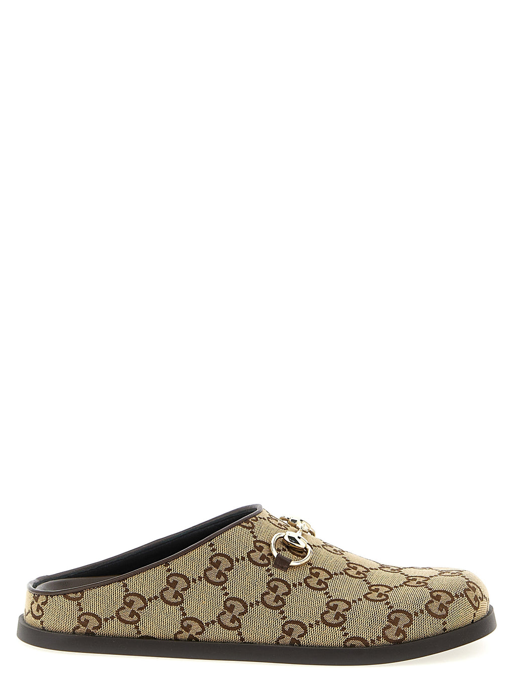 Mules en coton beige Gucci, élégantes et confortables, avec design épuré et logo Gucci visible sur la partie supérieure.