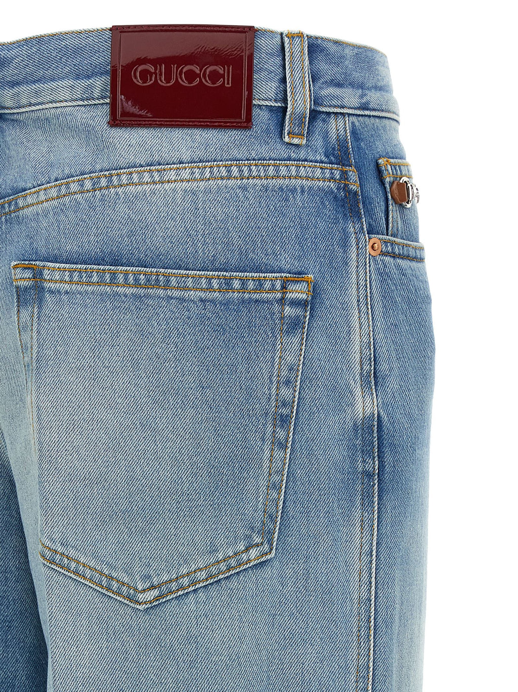 Jeans évasés en coton bleu Gucci, coupe tendance et détails élégants, parfaits pour un style décontracté et sophistiqué.