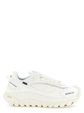 Chaussures de sport blanches en cuir Moncler, baskets athlétiques modernes et élégantes, vues de face sur fond neutre.