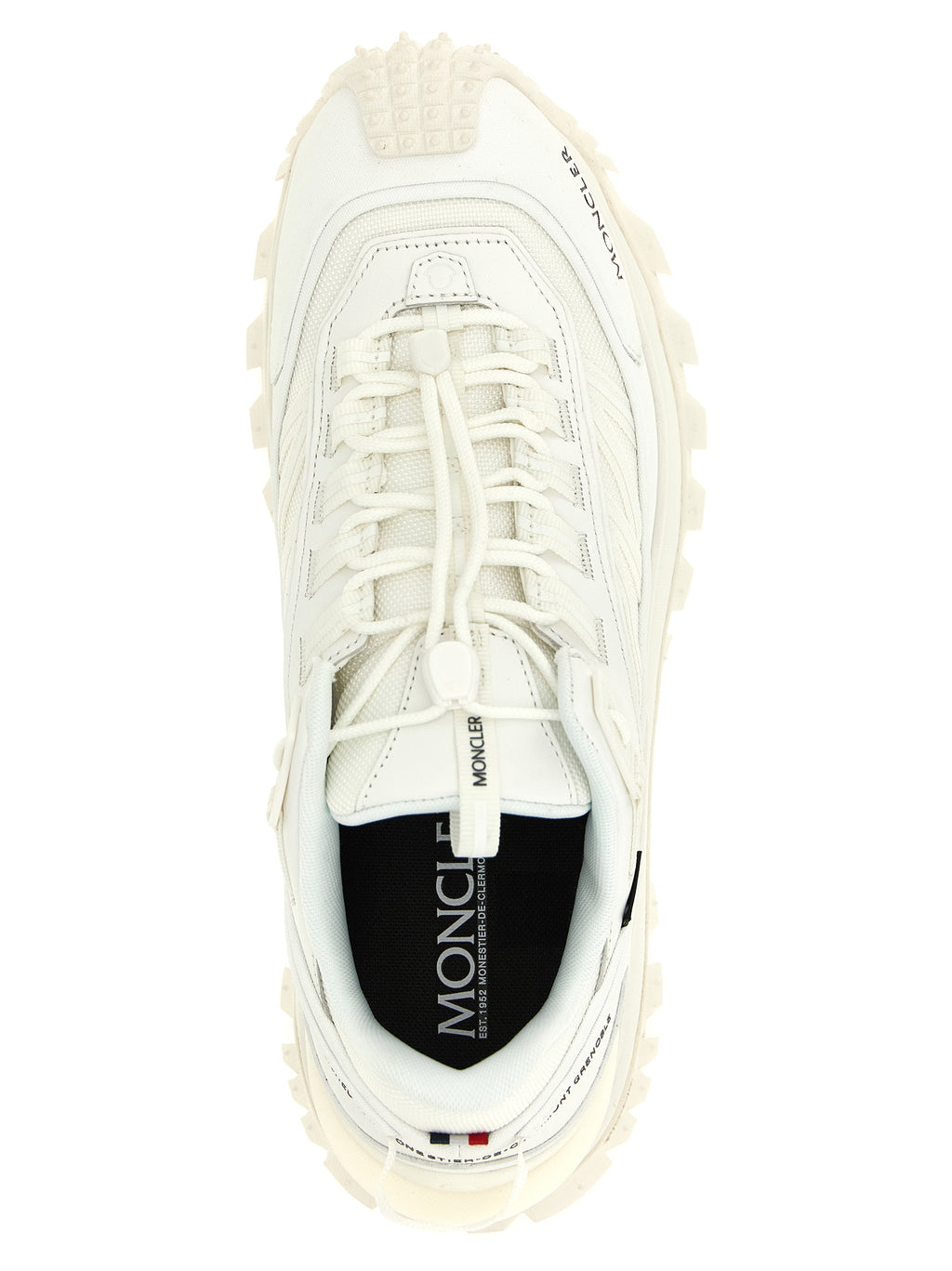 Basket montantes blanches Moncler en cuir pour sport, avec détails en tissu et semelle blanche.