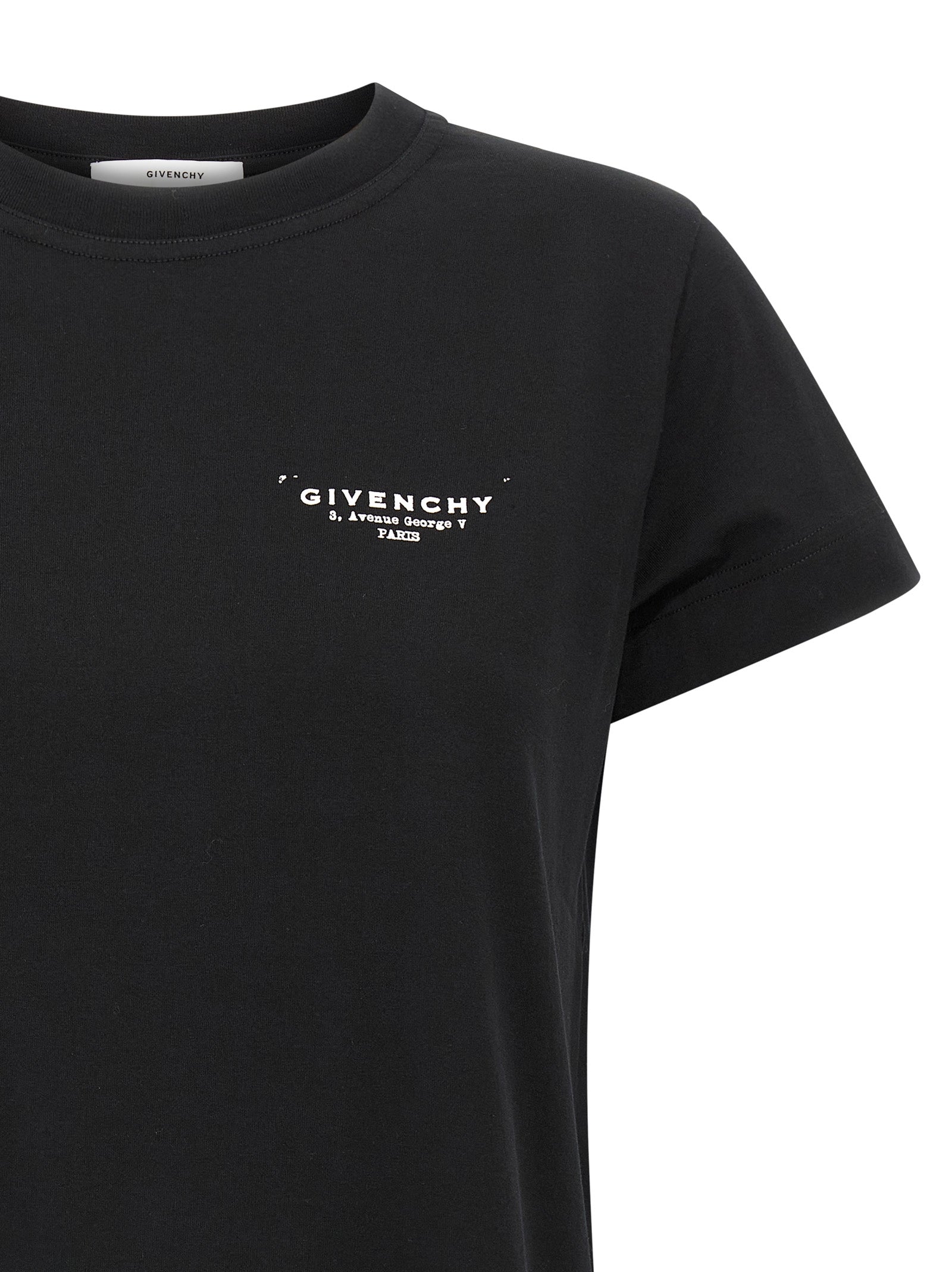 T-shirt en coton bicolore de Givenchy, coupe décontractée, avec logo discret, porté sur un mannequin.