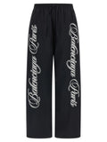 Pantalon athlétique multicolore en polyamide de Balenciaga, style moderne et confortable, visible sur un mannequin.