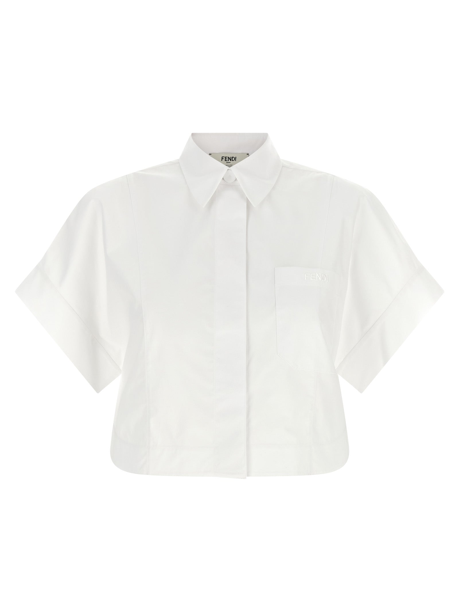 Chemise blanche en coton de la marque Fendi, détails élégants visibles sur la blouse.