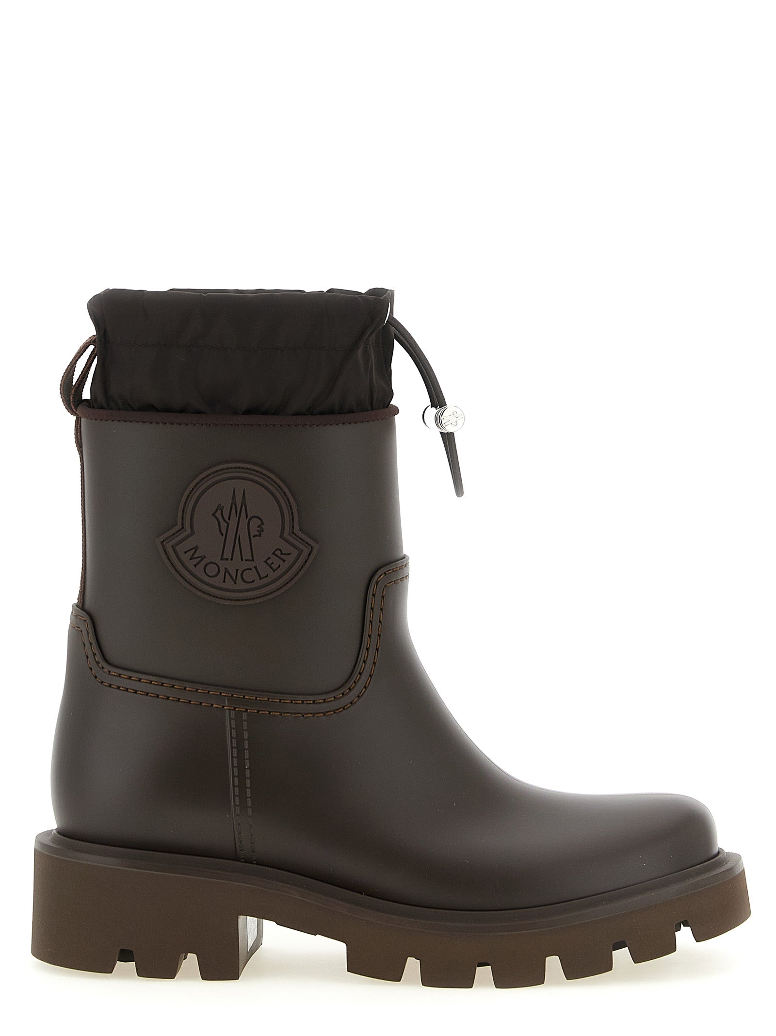 Bottes ankle en PVC marron Moncler, style moderne et résistantes, visibles avec semelle antidérapante et finition élégante.