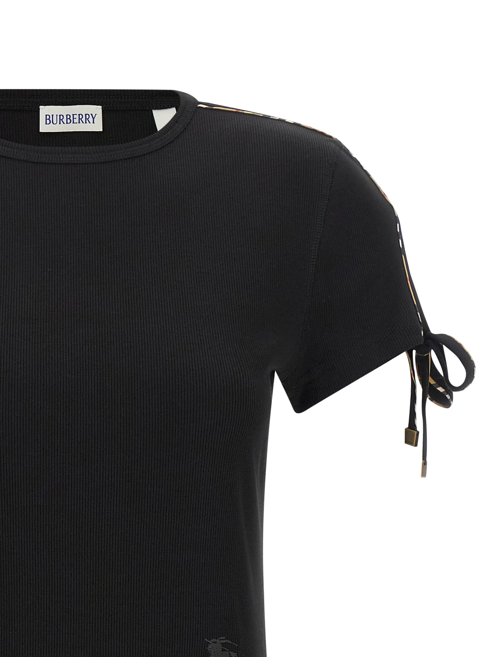 Robe courte en coton noir de Burberry, style élégant et décontracté, avec détails classiques de la marque.