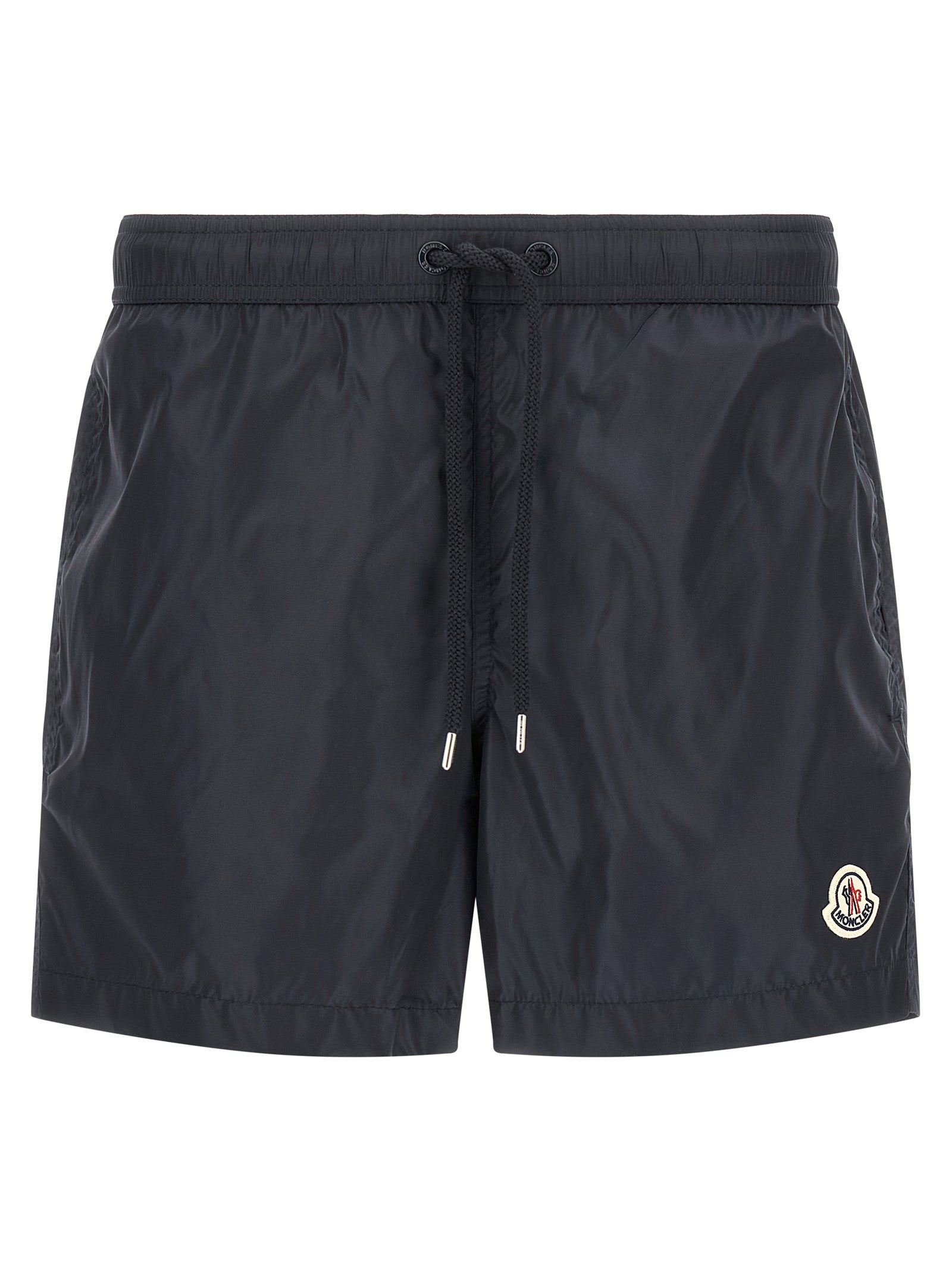 Shorts cargo en polyamide bleu Moncler, style décontracté avec poches latérales, tissu léger et résistant.