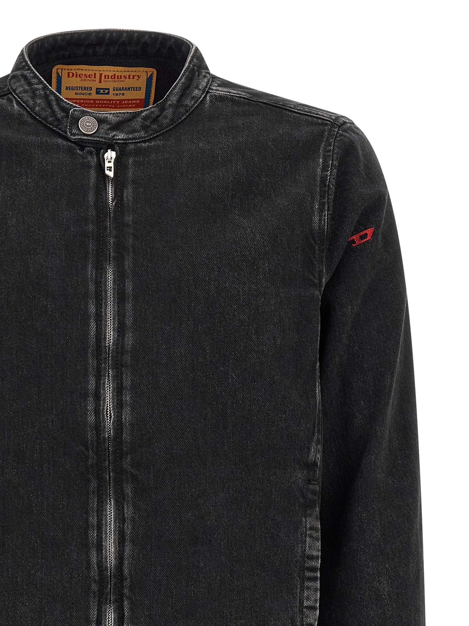 Veste en jean Diesel noire en coton, coupe classique, détails de couture visibles, style décontracté et tendance.