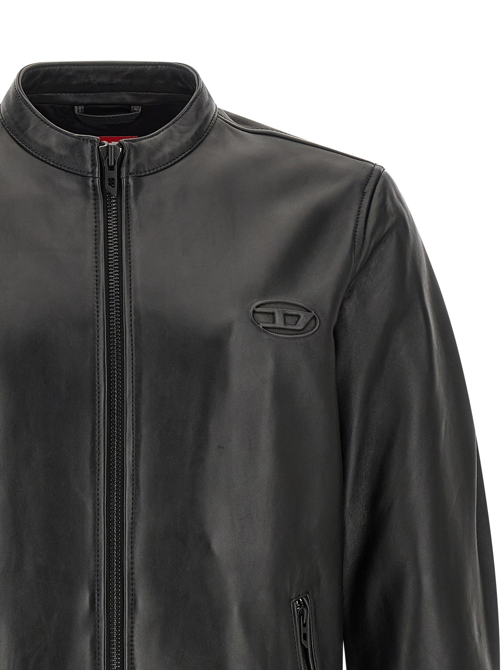 Veste en cuir noir en agneau de marque Diesel, style moderne avec col droit et fermeture éclair visible.