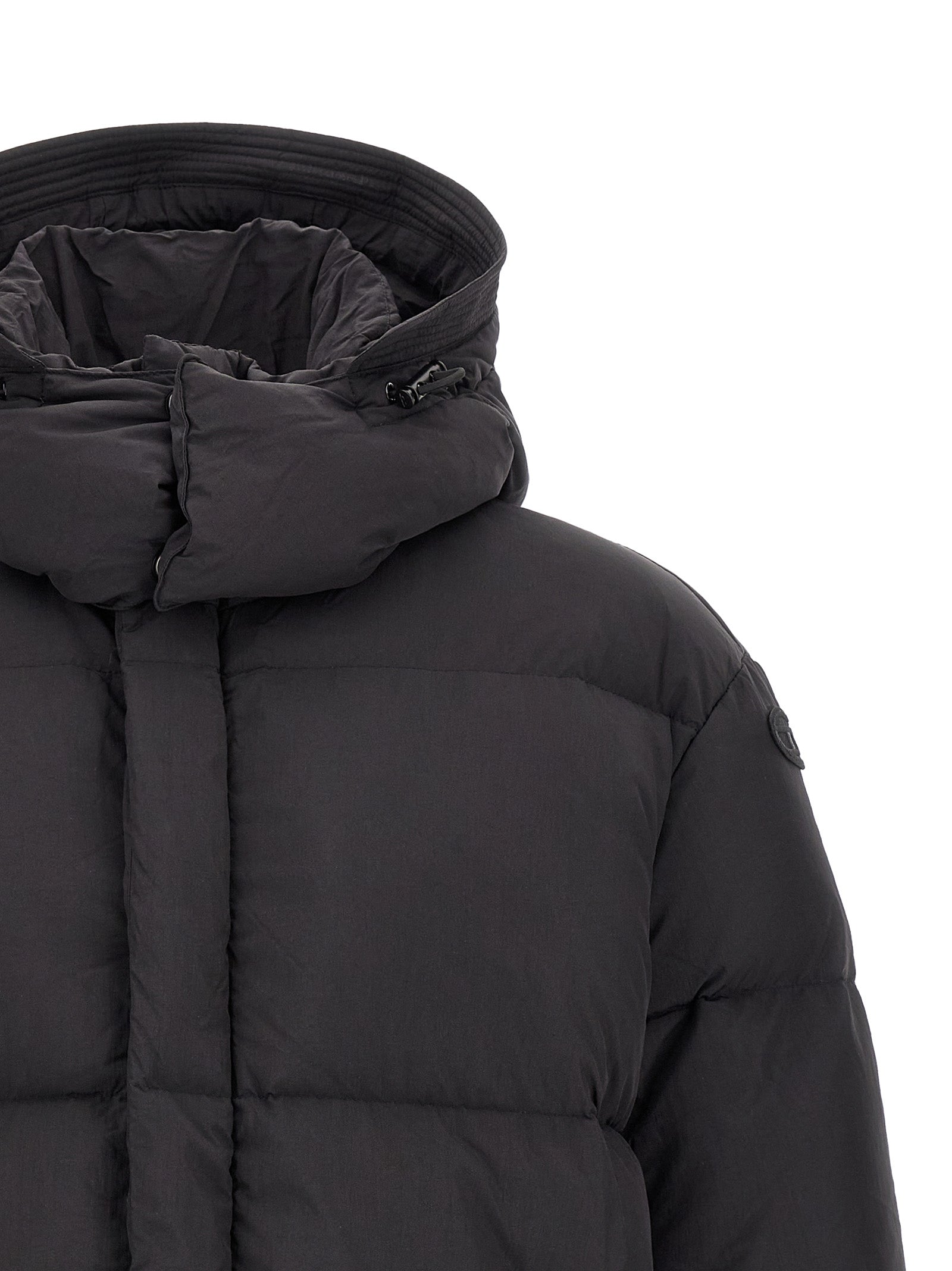 Veste Diesel noire en polyamide longue, style décontracté avec fermeture éclair et col montant, vue de face.