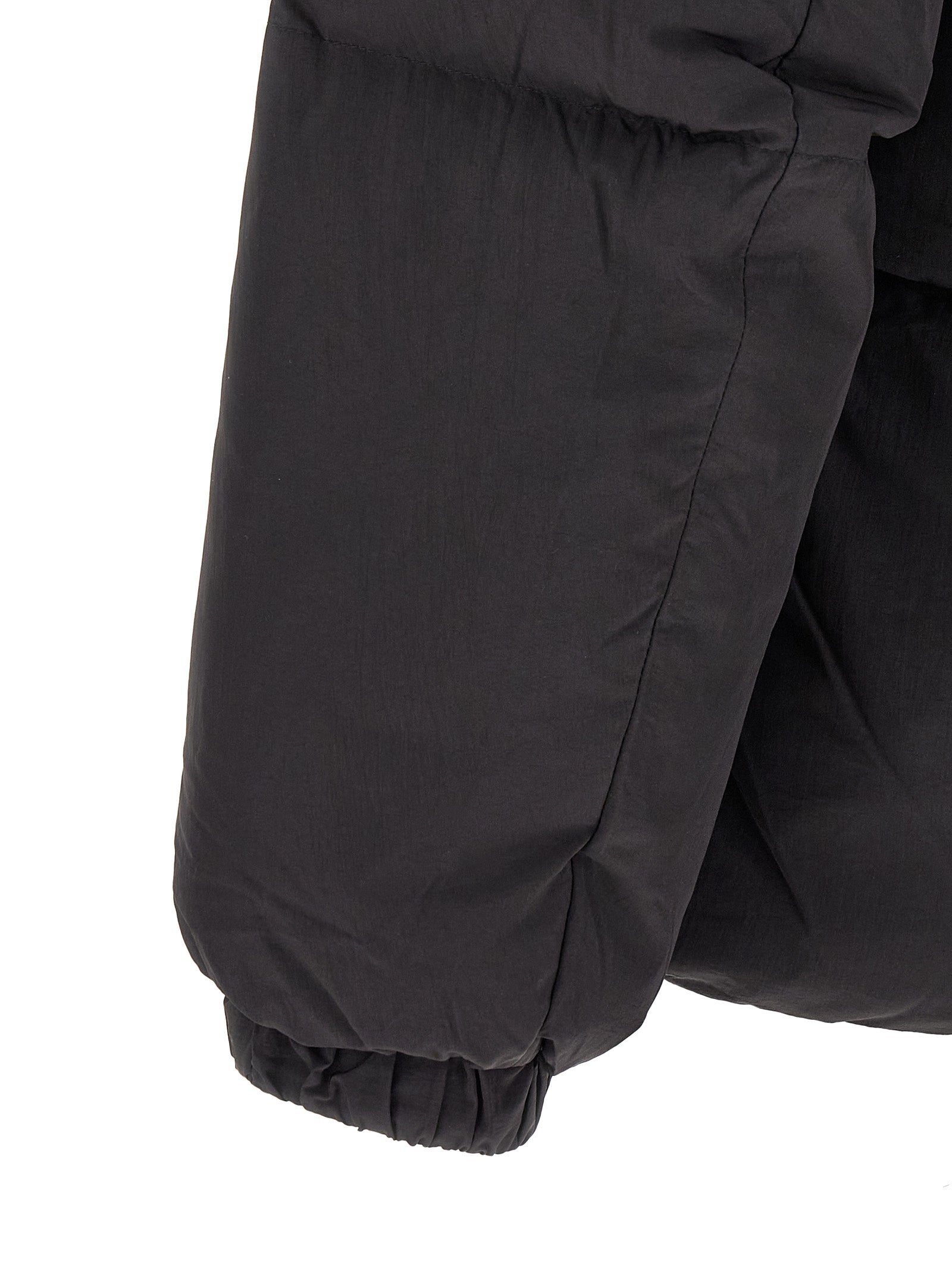 Veste longue Diesel en polyamide noir, style décontracté et moderne, avec fermeture zippée et détails en tissu.