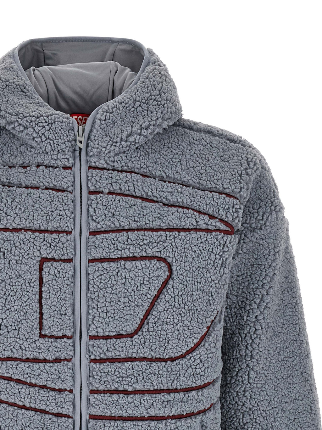 Sweat-shirt gris en polyester de la marque Diesel, coupe décontractée, avec logo discret sur la poitrine.