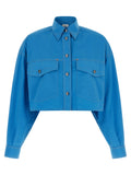 Blouse en coton bleue de la marque Versace, style élégant et sophistiqué, visible avec détails de la couture et du tissu.