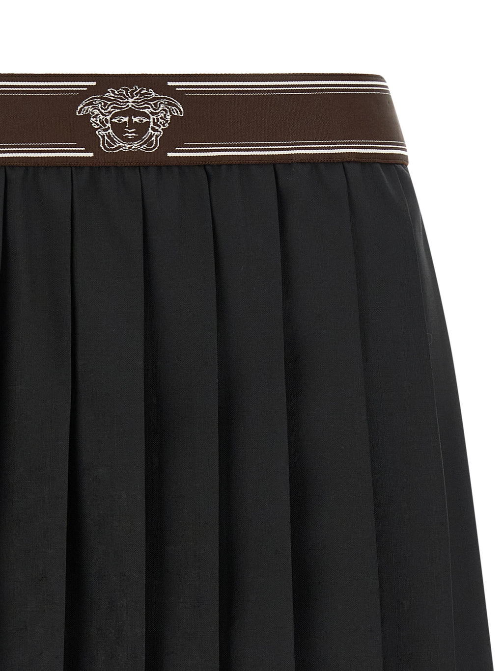Jupe longue en laine noire de la marque Versace, élégante et sophistiquée, visible en détail dans cette image.