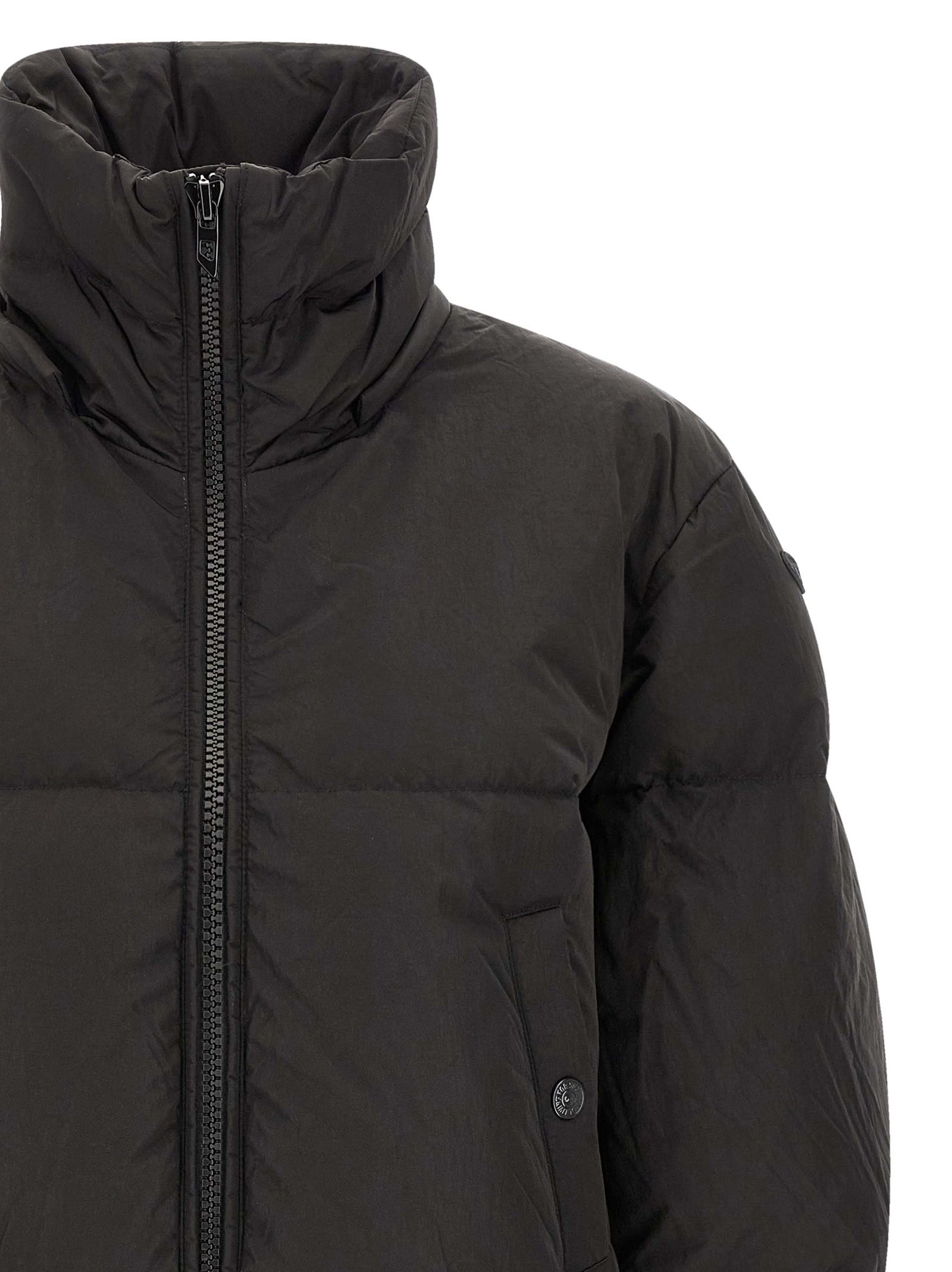 Veste longue en polyamide Diesel noire, style décontracté avec fermeture éclair et col montant, pour un look moderne et pratique.