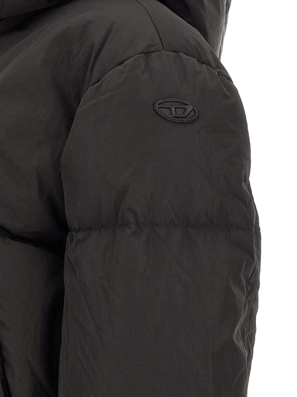 Veste longue Diesel en polyamide noir, coupe décontractée, avec fermeture éclair et col montant, visible sur l'image.