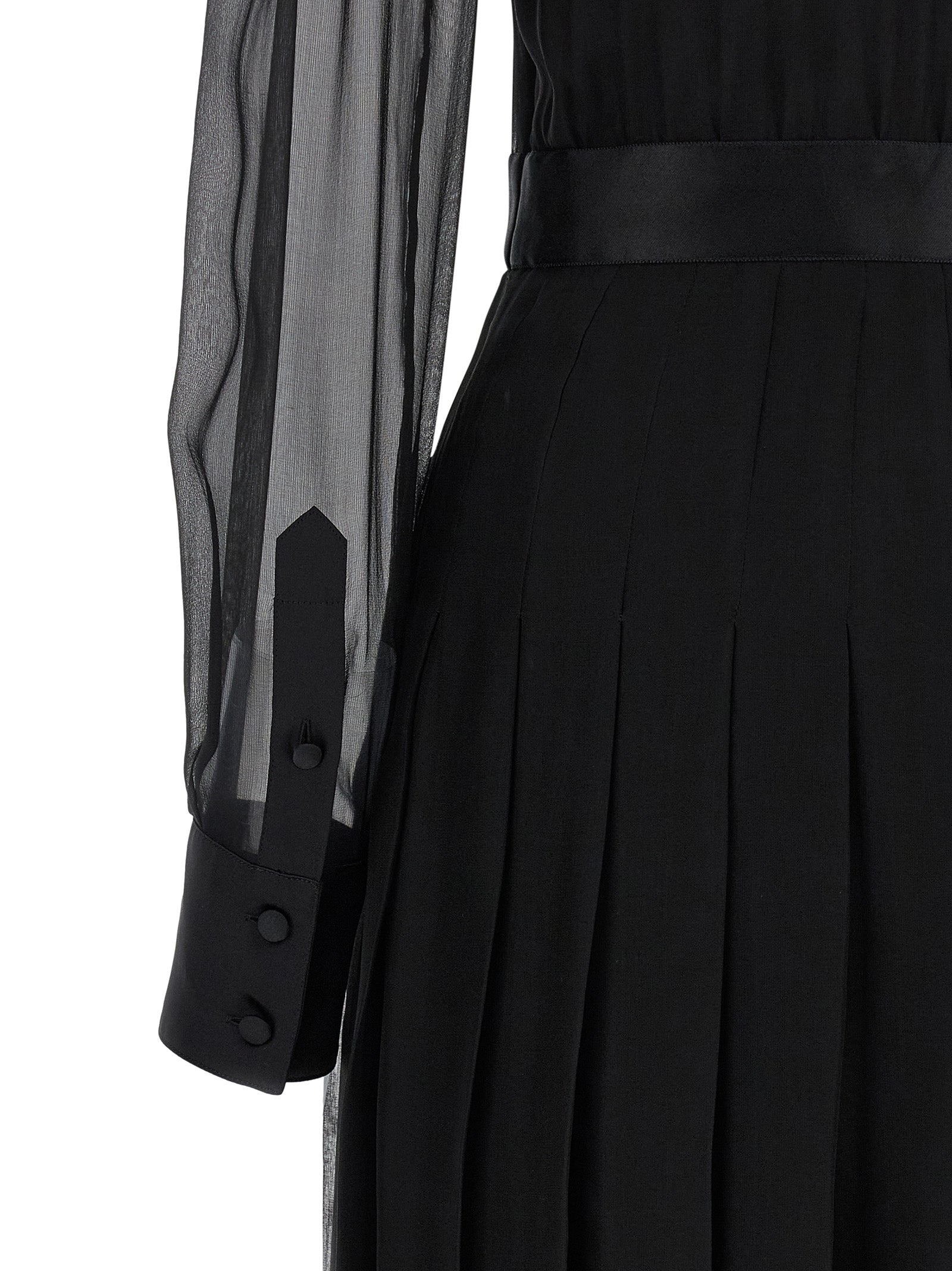 Robe midi en soie noire de Dolce & Gabbana, élégante et fluide, avec un design sophistiqué et des détails raffinés.
