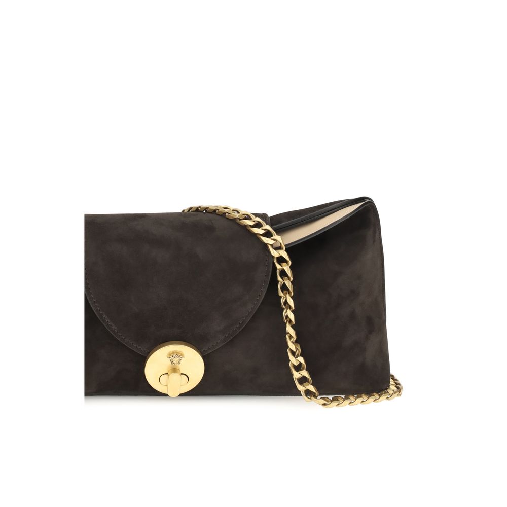 Sac clutch en cuir de veau marron Bos Taurus de Versace, avec logo emblématique, détails sophistiqués et finition élégante.