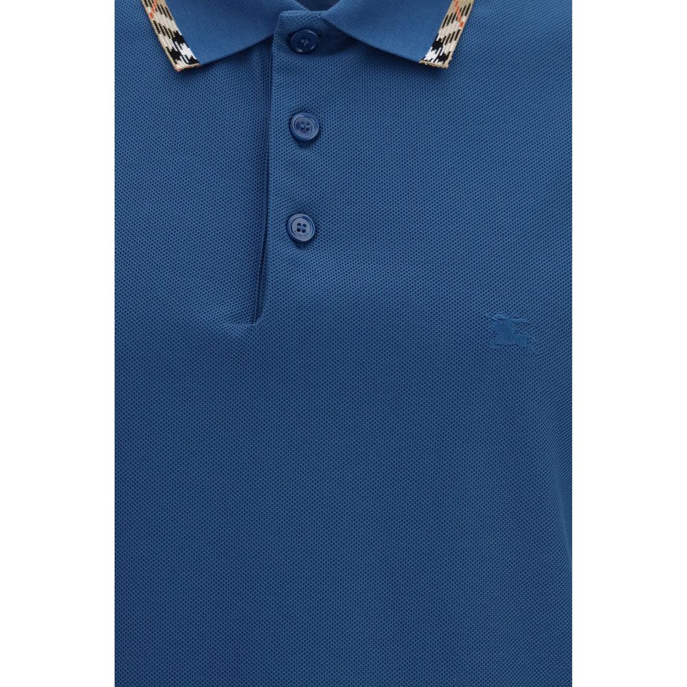 Chemise polo en coton bleu de Burberry, vêtement pour homme, avec col classique et logo discret sur la poitrine.