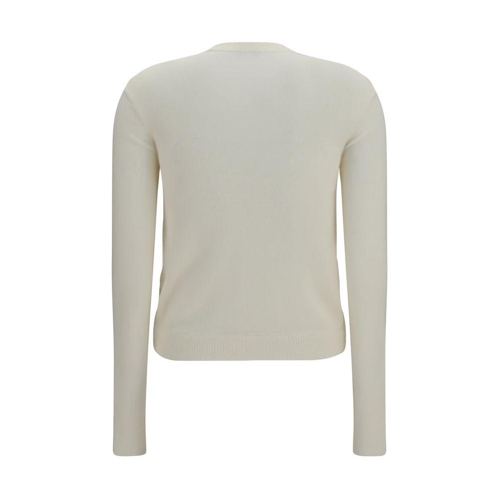 Cardigan beige en polyamide de la marque Burberry, détail des manches et du col.