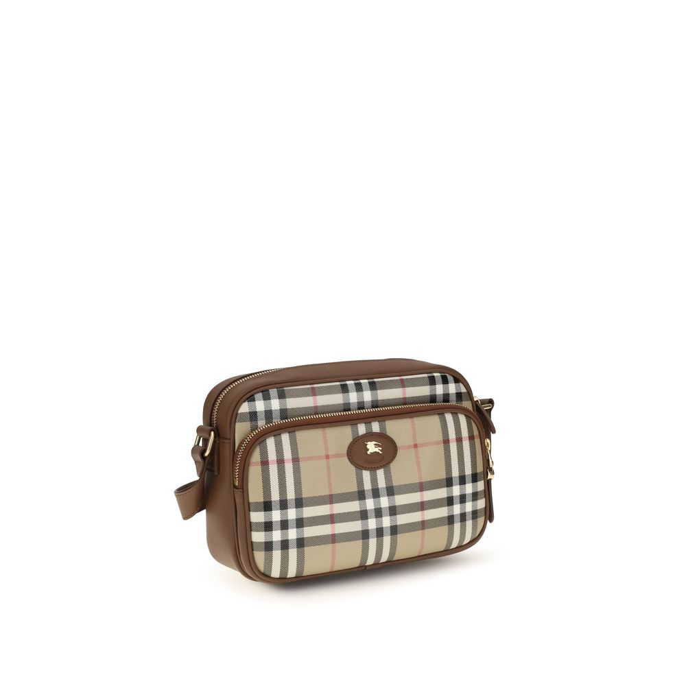 Sac à épaule en coton beige Burberry, élégant et raffiné, avec logo emblématique visible sur le devant.