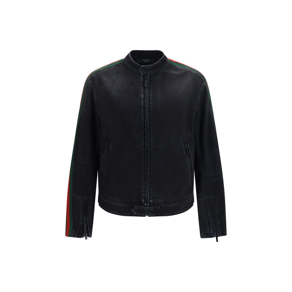 Veste en coton noire de style biker de Gucci, avec détails en cuir et fermeture éclair, mode élégante et audacieuse.