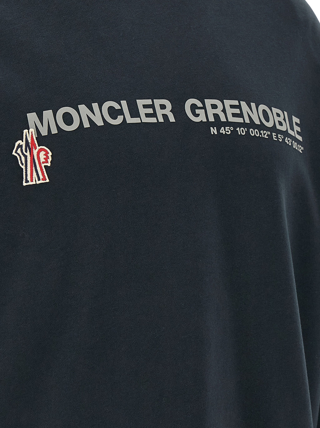 Sweat-shirt bleu en coton Moncler Grenoble, veste décontractée avec logo visible, confortable et tendance pour le sport ou la casual.