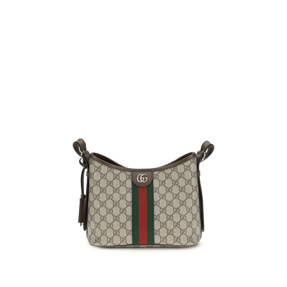 Sac à main en polyéthylène beige de Gucci, vue de face avec poignée en cuir et logo Gucci visible.