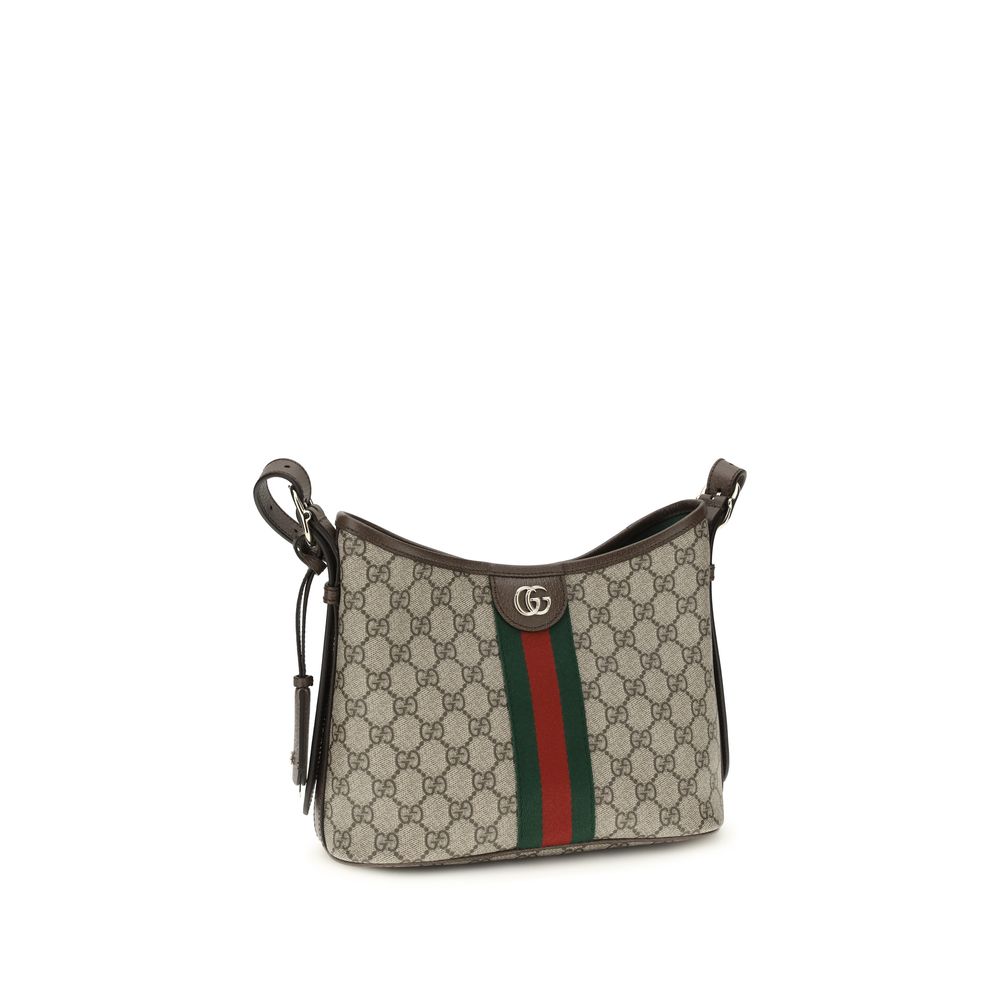 Sac à main en polyethylene beige de Gucci, avec design élégant et logo Gucci visible sur le devant.