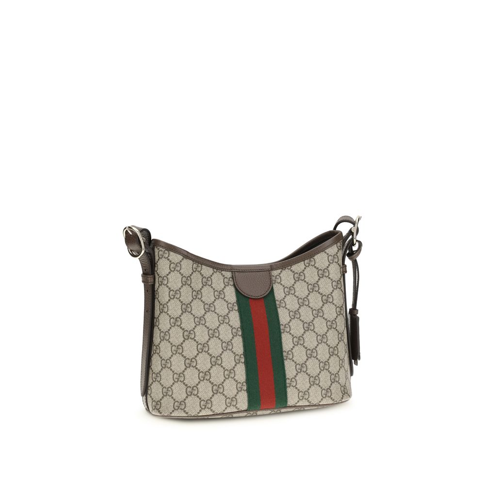 Sac à main Gucci beige en polyéthylène avec poignées, design élégant et moderne pour femmes