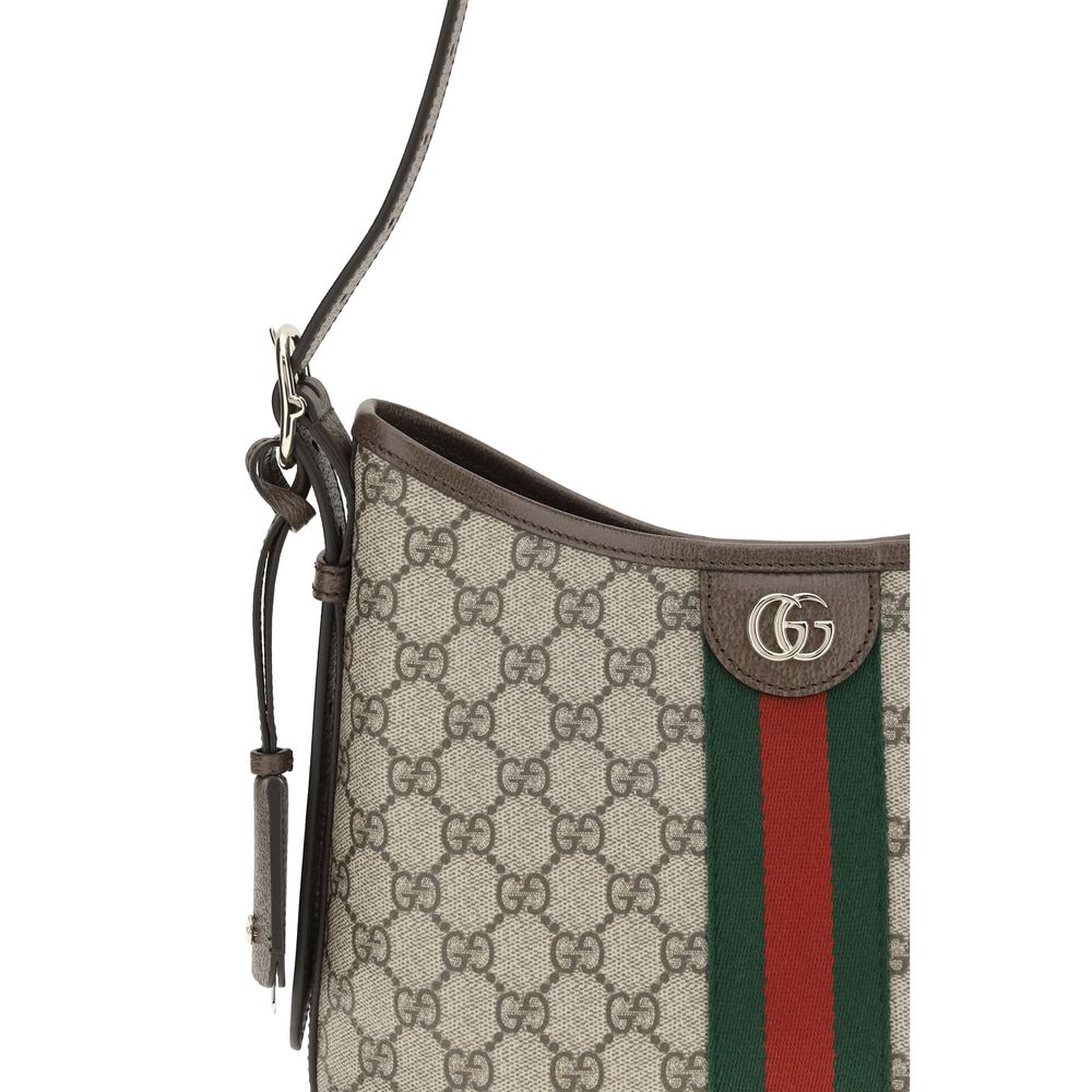 Sac à main en polyéthylène beige de Gucci, avec bandoulière et logo emblématique, visible sur l'image.