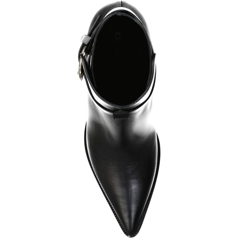 Bottes à talons hauts en cuir de veau noir de Celine, élégantes et sophistiquées, visibles sur l'image.