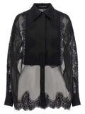 Chemise en soie noire de Dolce & Gabbana, élégante blouse pour femme avec détails raffinés et coupe fluide.
