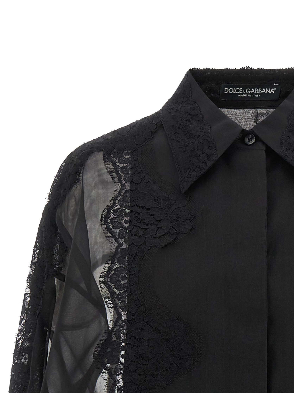 Chemise en soie noire Dolce & Gabbana avec col élégant et manches longues, portée décontractée et sophistiquée.