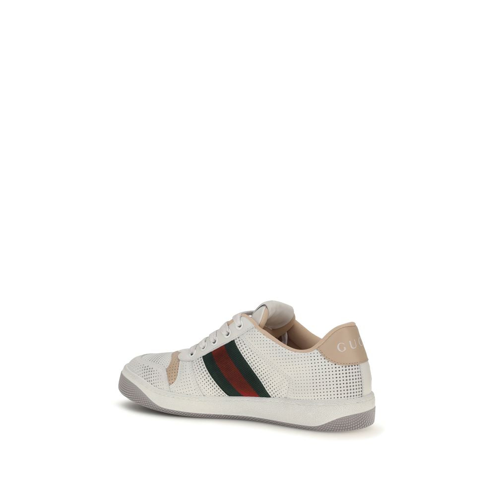 Chaussures de sport Gucci Bos Taurus en cuir blanc pour homme, avec semelle blanche et design élégant.