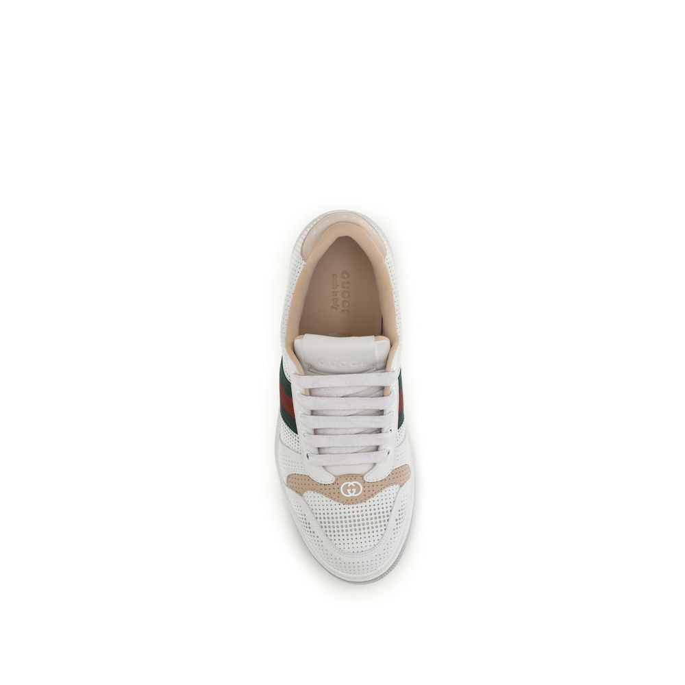 Sneakers Gucci Bos Taurus en cuir de veau blanc pour athlétisme, avec semelle blanche et design élégant.