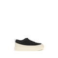 Sneakers athlétiques Moncler Bos Taurus en cuir de veau noir, style sportif avec design moderne et détails élégants.
