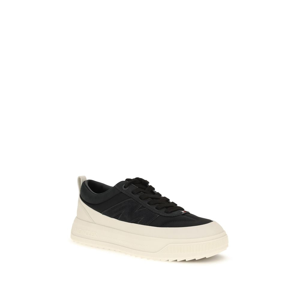 Chaussures de sport Moncler Bos Taurus en cuir de veau noir, sneakers athlétiques élégants et confortables.