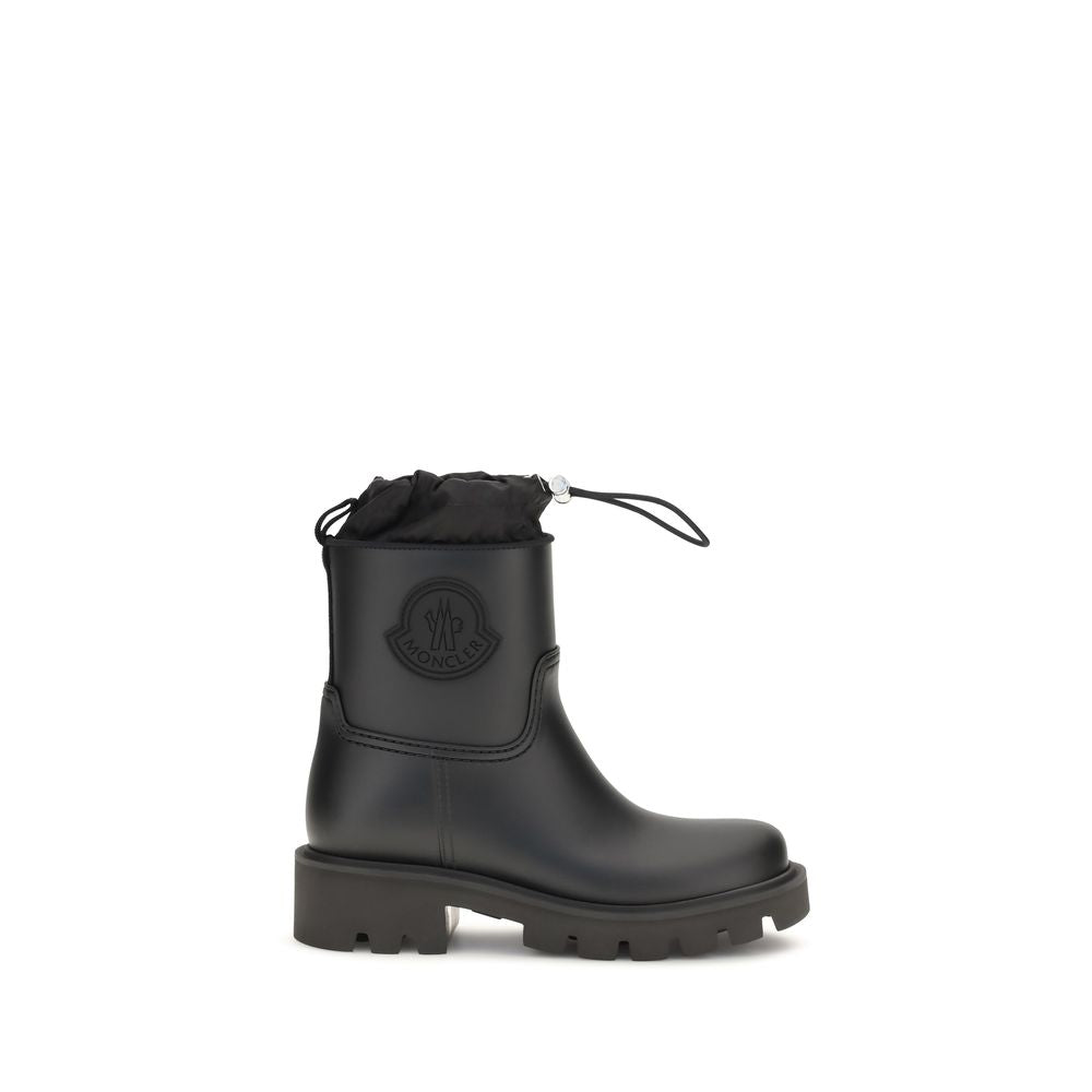 Bottes de pluie noires en PVC de la marque Moncler, résistantes et imperméables, pour un style pratique et élégant.
