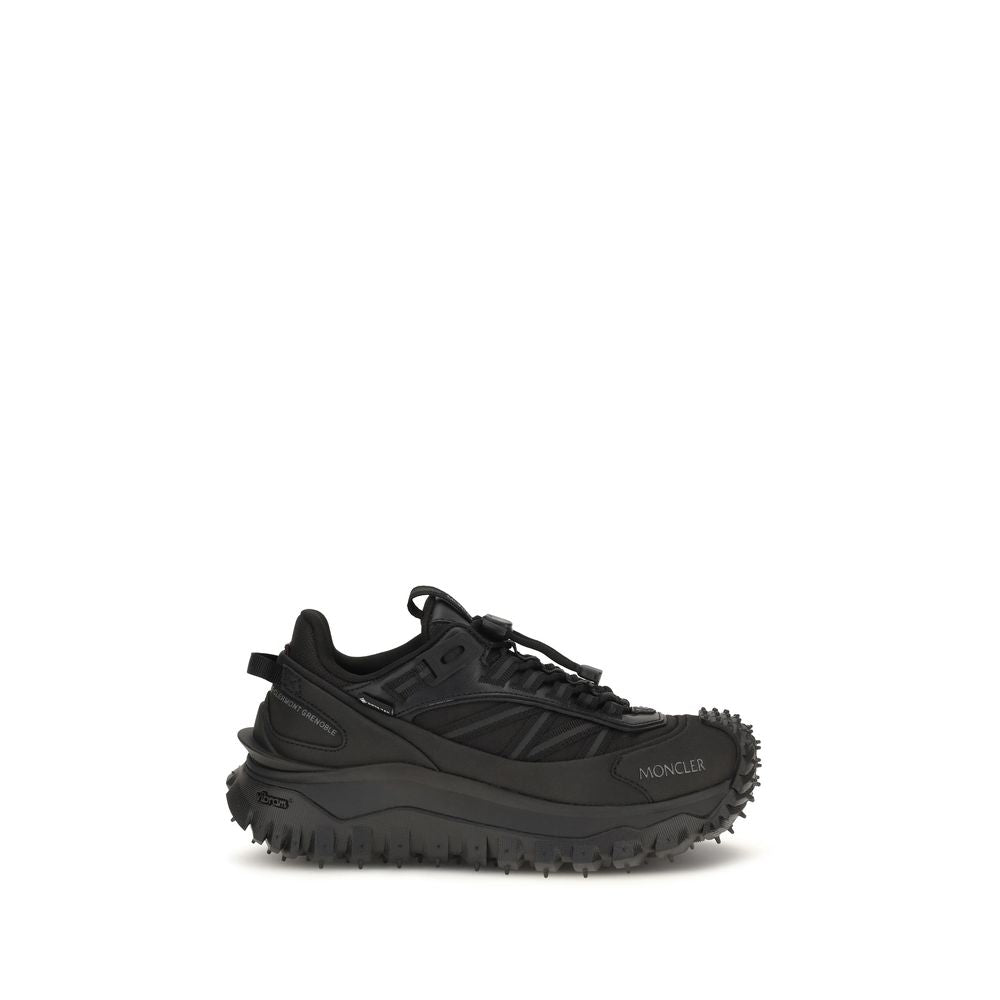 Chaussures de sport Moncler Bos Taurus en cuir de veau noir, baskets athlétiques modernes et élégantes.