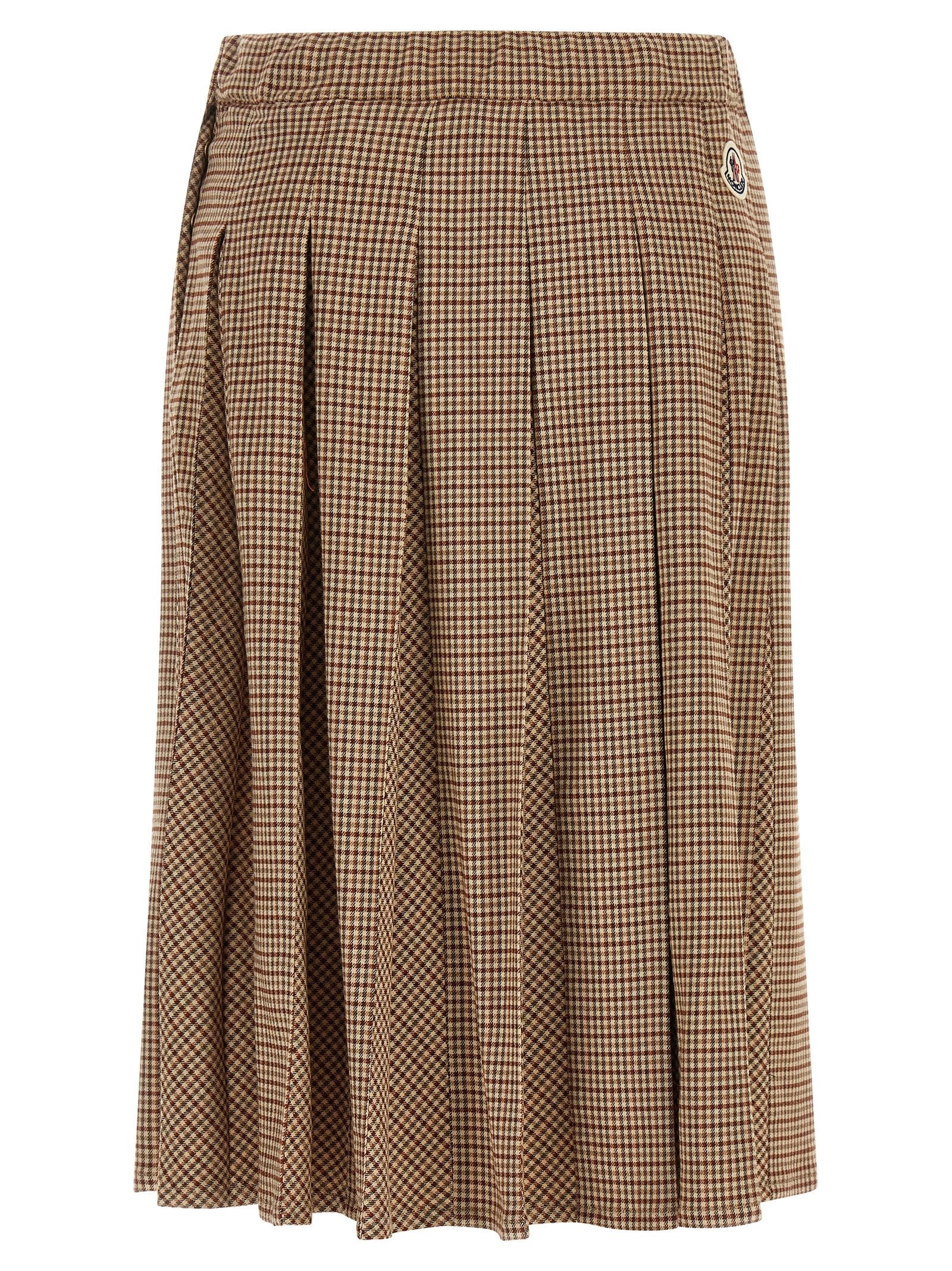 Jupe midi beige en viscose de Moncler, élégante et fluide, affichant une coupe flatteuse et un tissu léger.